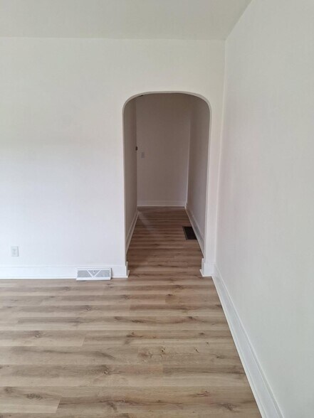 Building Photo - 123-125-125 E 2nd St