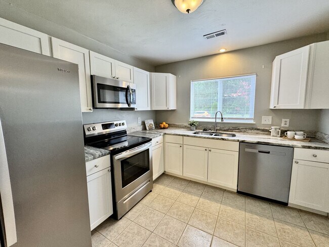 Building Photo - Completely Updated & Ready NOW!! 1-Car Attached Garage, Pet Friendly, Fenced Yard! Community Park