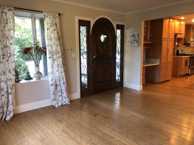 Barely see the office nook in the kitchen - 110 Taormina Ln