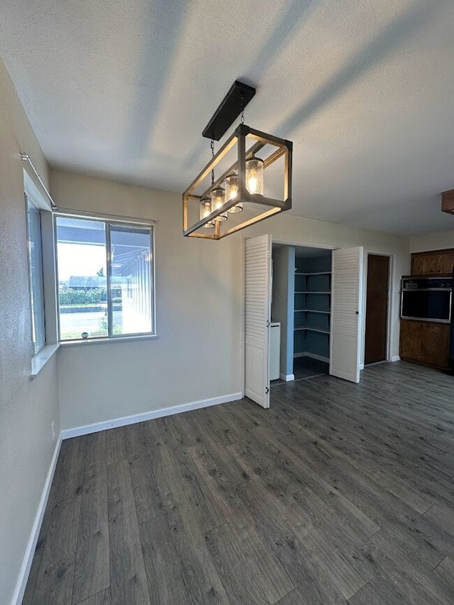 Building Photo - New exterior paint!  LVP flooring! Large y...