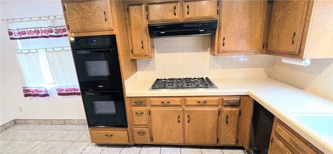 Building Photo - 10353 Downey Ave