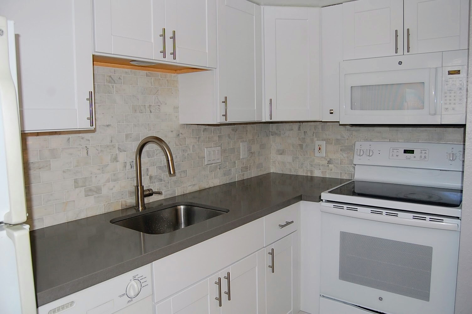 Marble Backsplash Quartz Countertops New Cabinets New Appliances - 2500 Burleson Rd