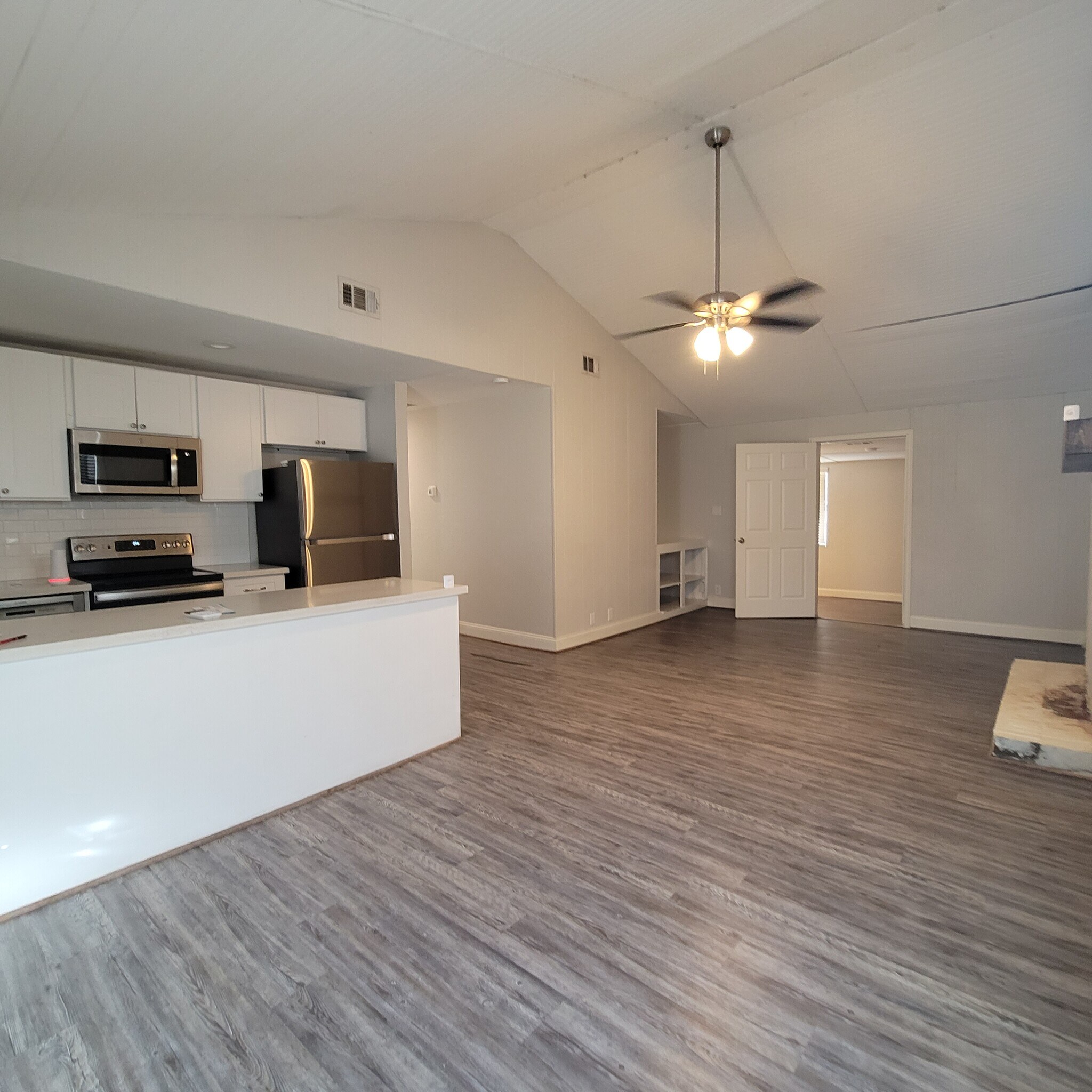 View from entryway to kitchen & den - 26445 Lazy Ln