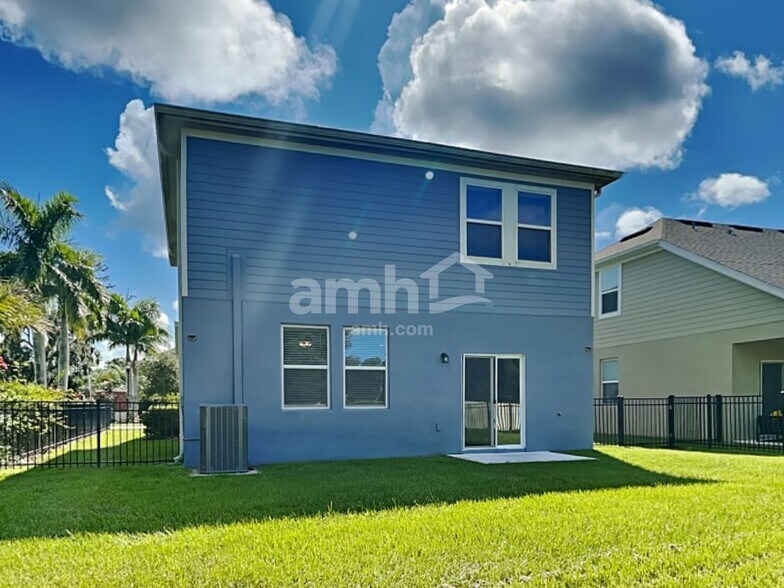 Building Photo - 6605 Hidden Rose Pl