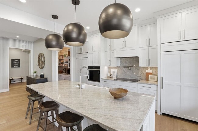 Building Photo - Modern 5-Bed Home in Atlas Waterfront — Elevator, Luxury Finishes & Prime Location