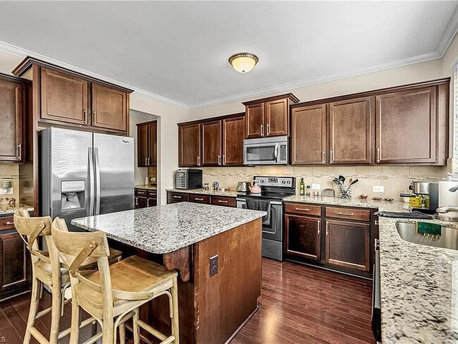 Building Photo - Earn Wealth While Leasing - Like a Homeown...
