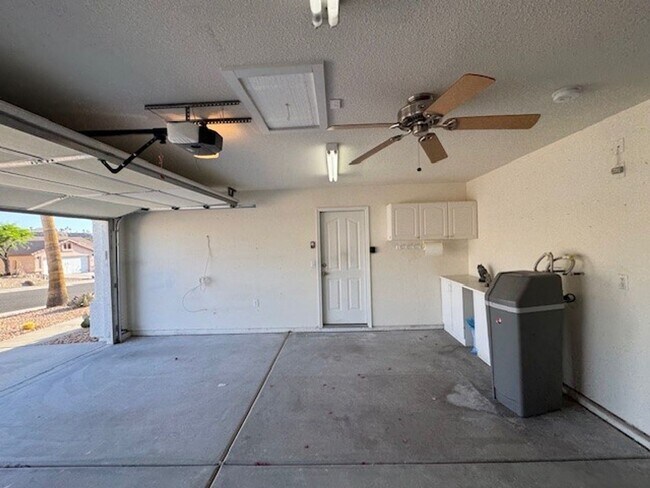 Building Photo - 2BR + 2 BONUS ROOMS with 54 foot Long Boat/Toys DEEP Garage