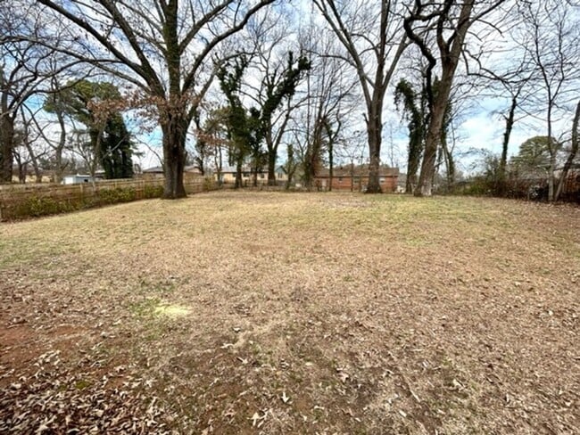 Building Photo - THREE BEDROOM ONE AND HALF BATH BRICK RANCH HOME