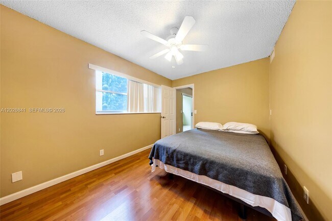 Building Photo - 6075 N Sabal Palm Blvd