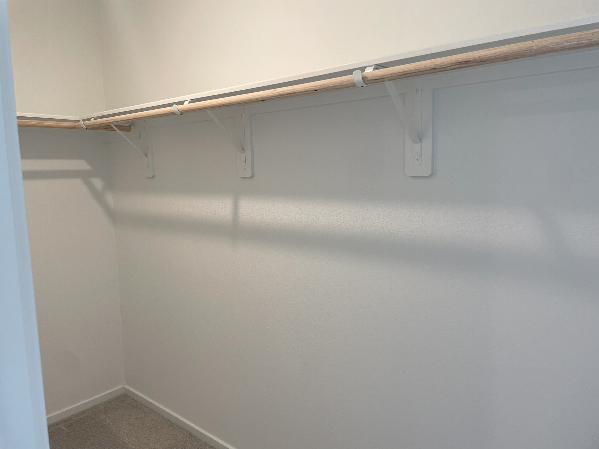 Primary bedroom walk in closet - 25665 Rose Creek Dr