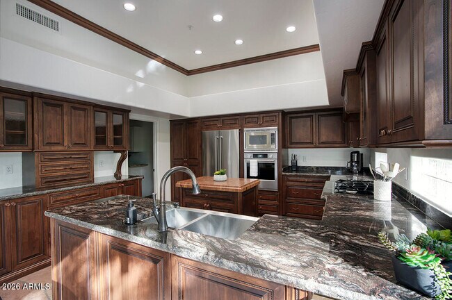 Building Photo - 7747 E Monica Dr