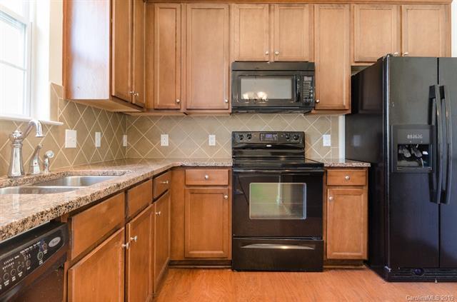 Building Photo - "Charming 3-Bed Oasis with Granite Accents & Pool Retreat in Belmont!"