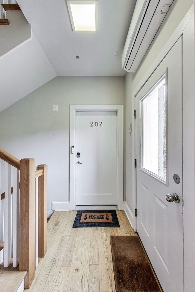 Building Photo - Welcome to Unit 202 at the Arboretum Condo...