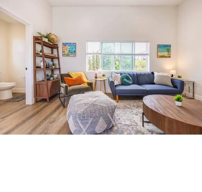 Beautifully light and bright, you will enjoy reading your books in this living room. - 3355 Lloyd St