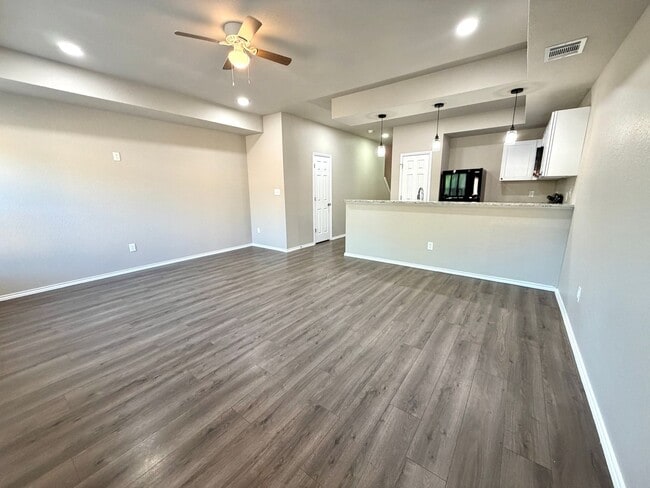 Building Photo - Modern 3BR Townhome w/ Garage, Private Yard & No Carpet – Built 2022