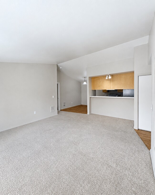 Building Photo - FREE August Rent! Spacious 1-Bedroom with Vaulted Ceilings & In-Unit Laundry!