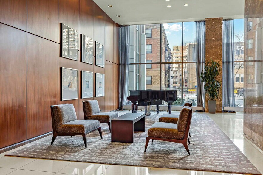 lobby with piano - 655 W Irving Park Rd