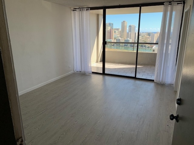 New flooring & curtains in living room - 2100 Date St