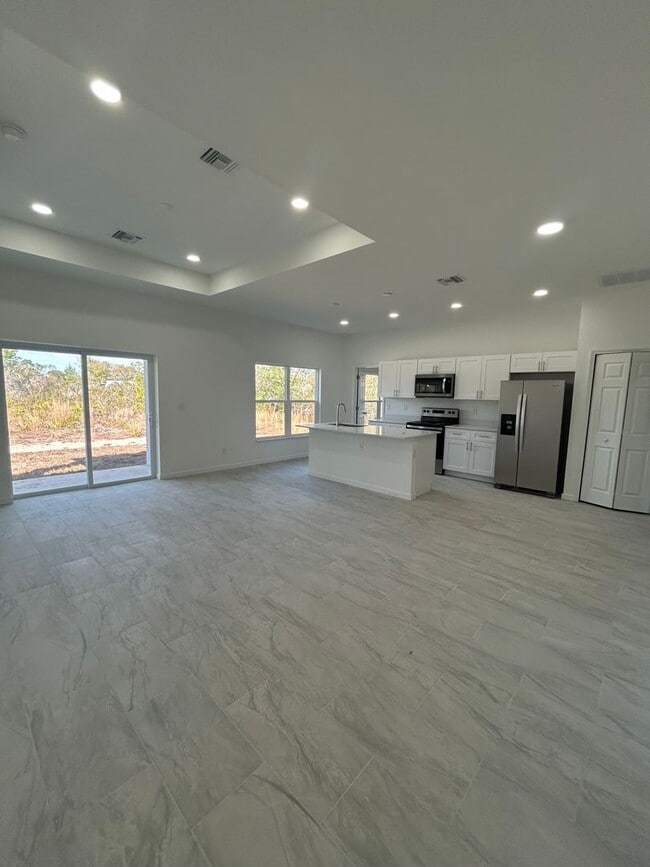 Building Photo - JUST BUILT! Spacious 4/2/2 Home -Perfect for Your Family in SW Lehigh Acres