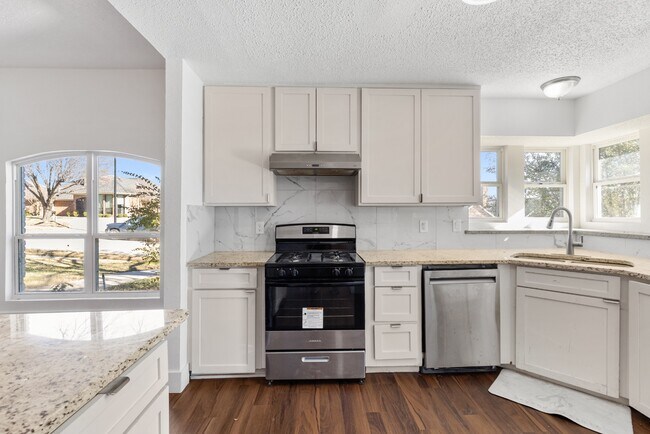 Building Photo - Updated in Garland