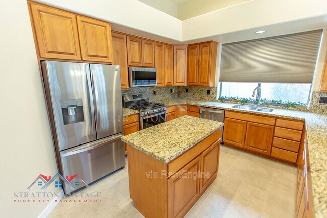 Building Photo - 9562 E Cavalry Dr