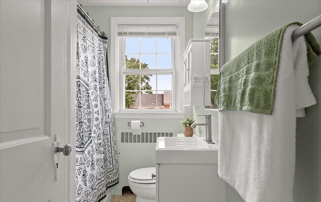 Building Photo - Updated 3BR Catonsville Townhome | Rear Parking + Deck