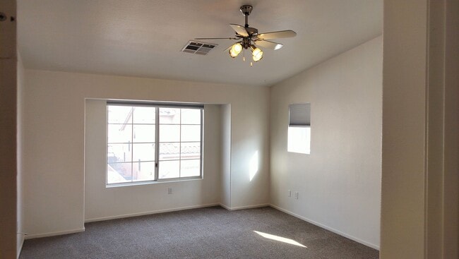 Building Photo - Townhome with Loft + Two Bedrooms/Baths - Designed for Comfort in Gated Community