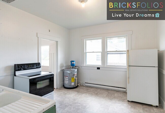 Building Photo - Nestled in the heart of a warm and welcomi...