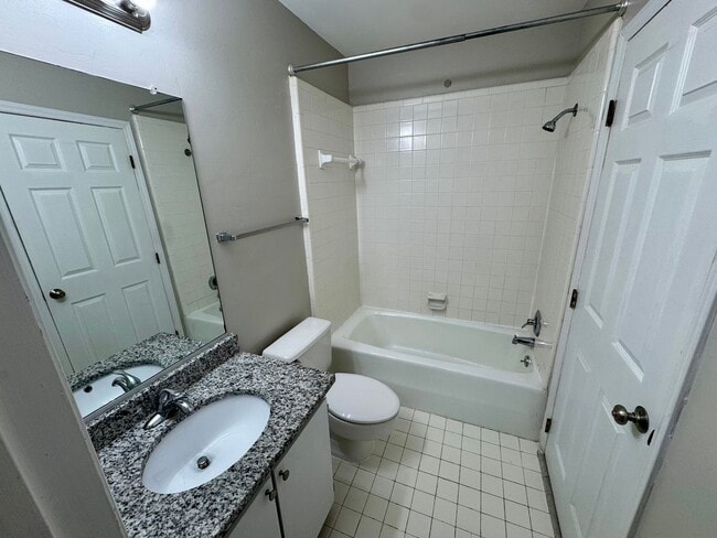 Building Photo - Top-Floor End Unit Condo at New Bern Place