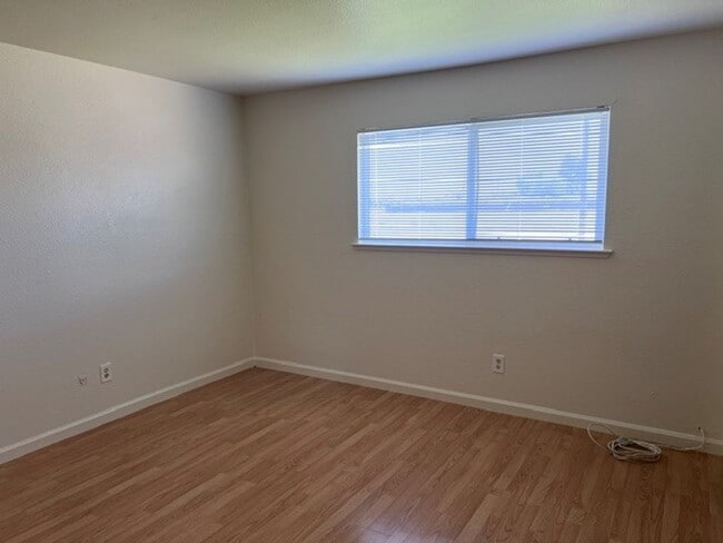 Building Photo - Freshly painted 4 bedroom home on over 2 acres of land.
