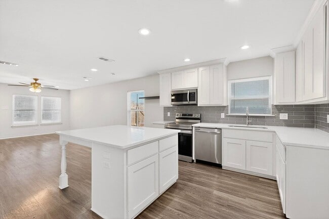 Building Photo - Bright Corner Lot Home with Open Living and Island Kitchen