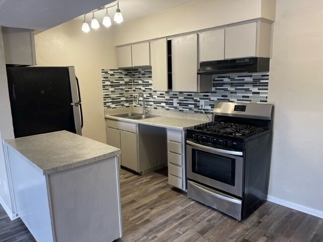 Backsplash is beautiful! - 808 at South Center Apartments