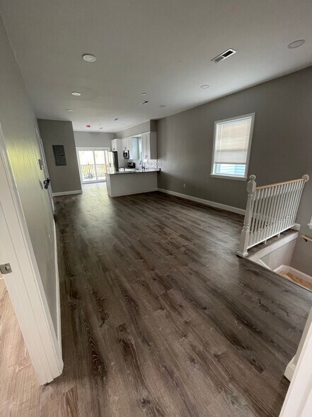 Unit two: view of open-concept unit from master bedroom. - 34 Falcon St