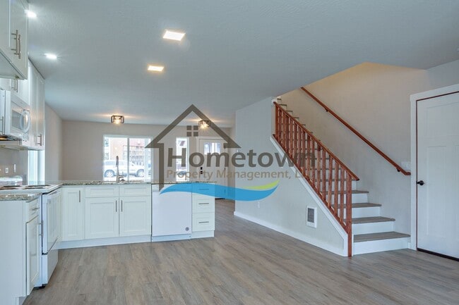Building Photo - 3 Bedroom Home with 1.5 Bathrooms and an A...