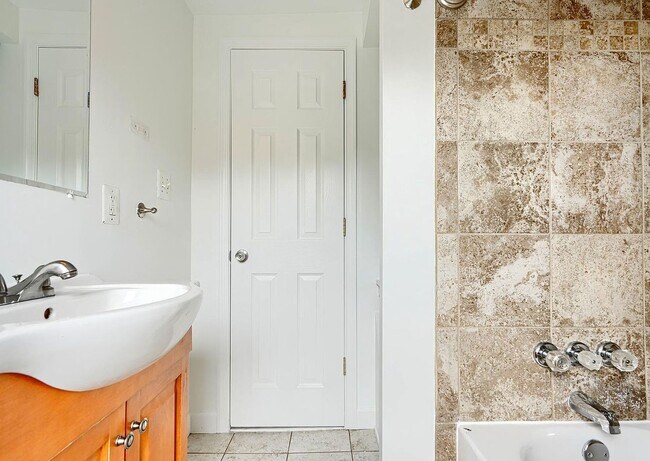Building Photo - Updated End-of-Group Townhome with Finished Lower Level, Fenced Yard & Community Pool
