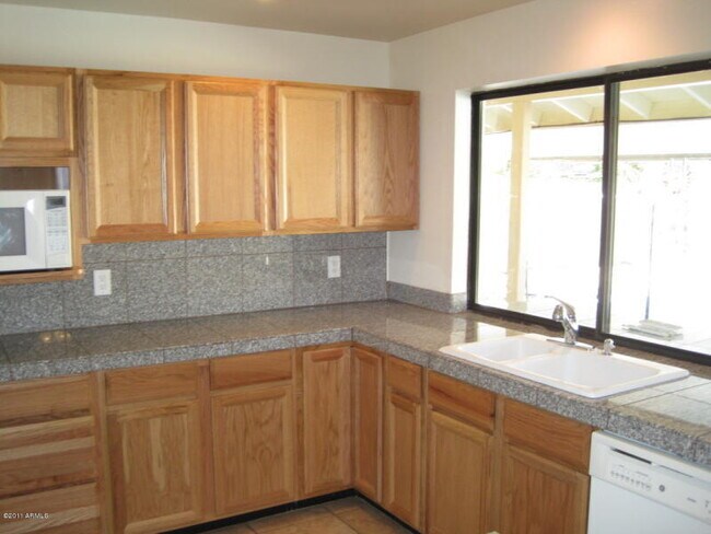 Building Photo - “Spacious 4-bedroom home with private pool in prime Tempe location!”