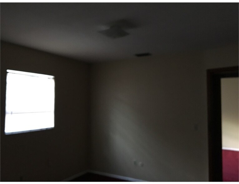 Building Photo - 3725 E 38th Ave