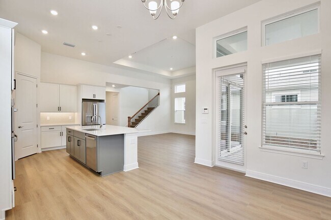 Building Photo - Gorgeous 4/3 Residence with a Private Back Lanai and a 2 Car Garage in the Delightful Laureate Pa...