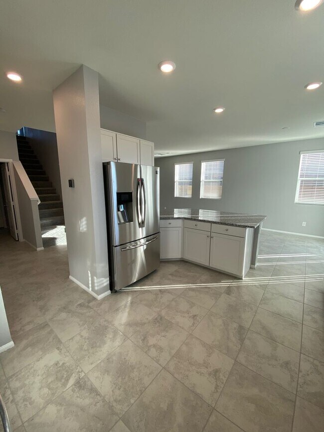 Building Photo - Modern North Las Vegas Townhome with Granite Countertops, Covered Patio & Open-Concept Living