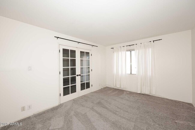 Building Photo - 7910 E Camelback Rd