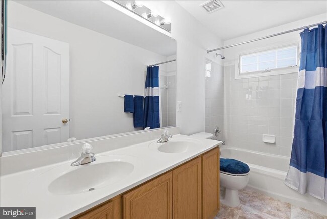 Building Photo - 8863 Flatbush Ct