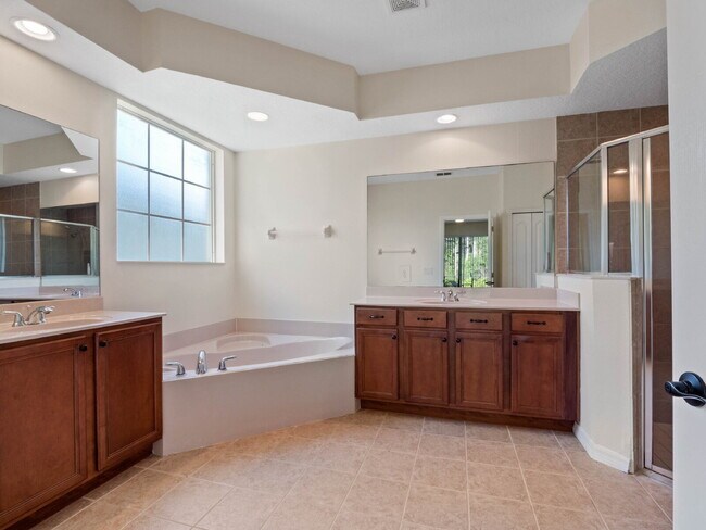 Building Photo - Spacious 4-Bedroom Pool Home with 3 Full B...
