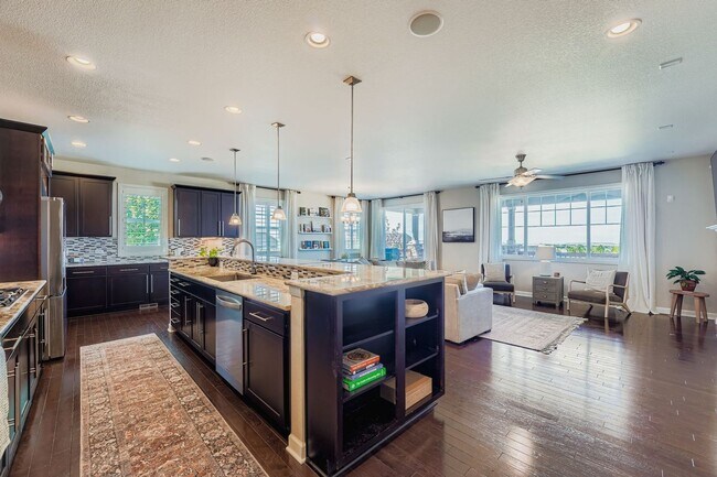 Building Photo - Beautifully maintained 5-bedroom home with a large finished basement, club access, and top-rated ...