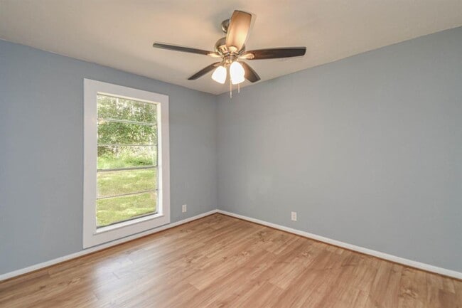 Building Photo - 3680 Woodpeckers Grove
