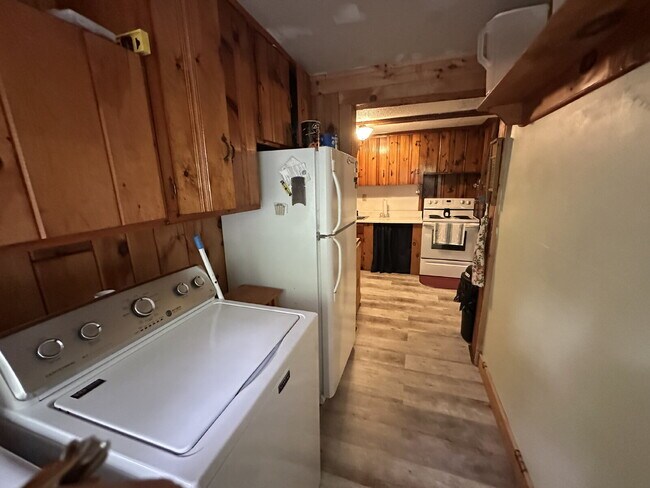 Building Photo - Charming 3BR Waterfront Retreat with Sunroom, Brick Accent & Scenic Lake Views