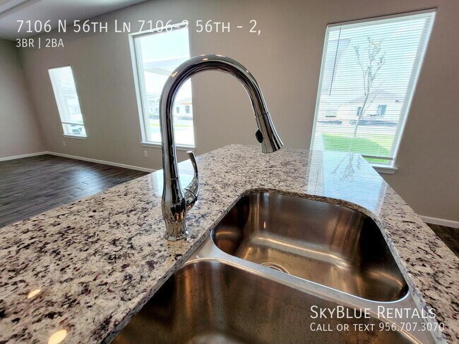 Building Photo - 7106 N 56th Ln