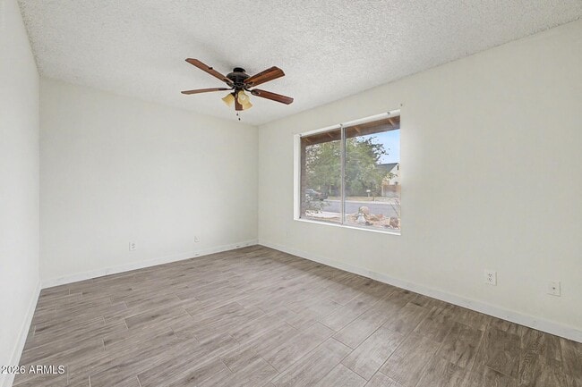 Building Photo - 6616 W Aire Libre Ave