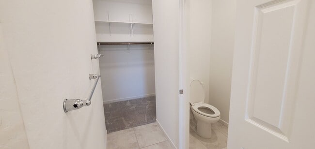 Building Photo - Beautiful townhome features a bright, open-concept layout
