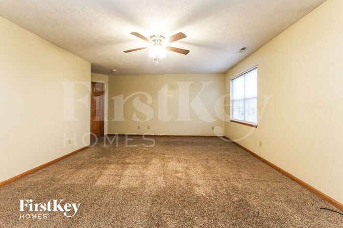 Building Photo - 1027 W Palomino Pl
