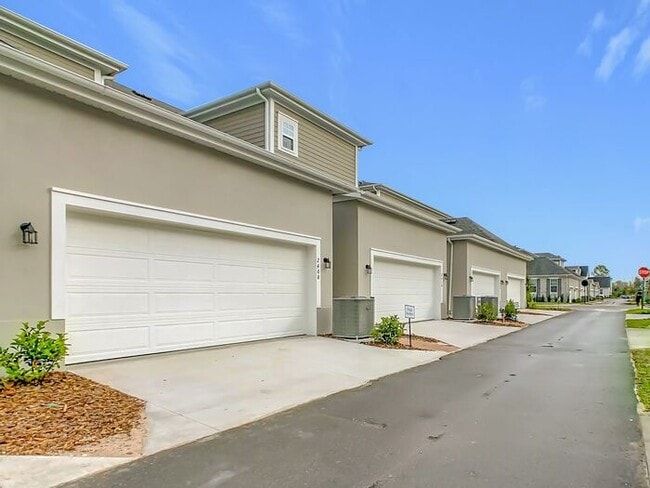 Building Photo - Brand New Luxury Town House in Island Village a Celebration, FL maintenance free community.